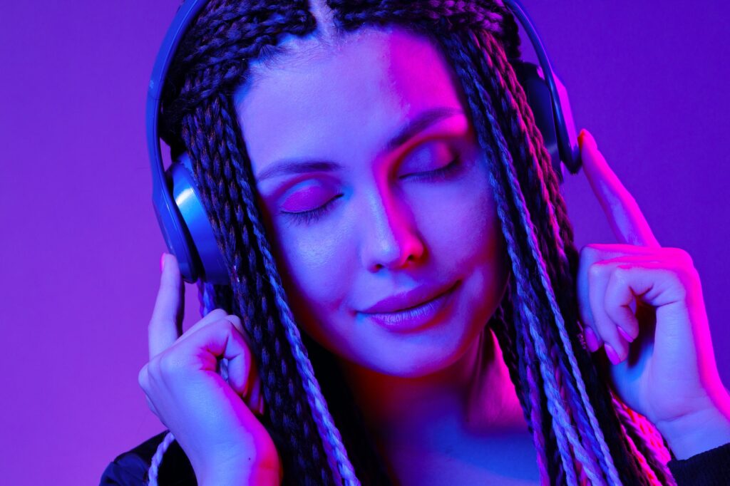 Woman listening to music with headphones