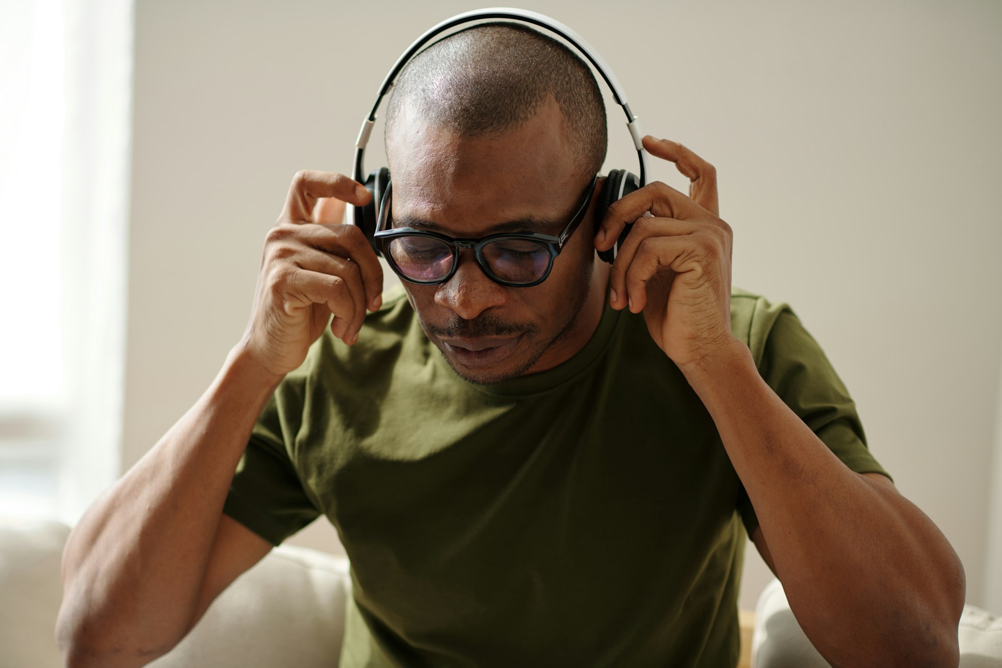 Man Putting on Headphone